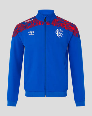 A royal blue track jacket with red patterned shoulder panels, featuring the Umbro logo and Rangers FC crest on the chest, displayed against a neutral gray background.