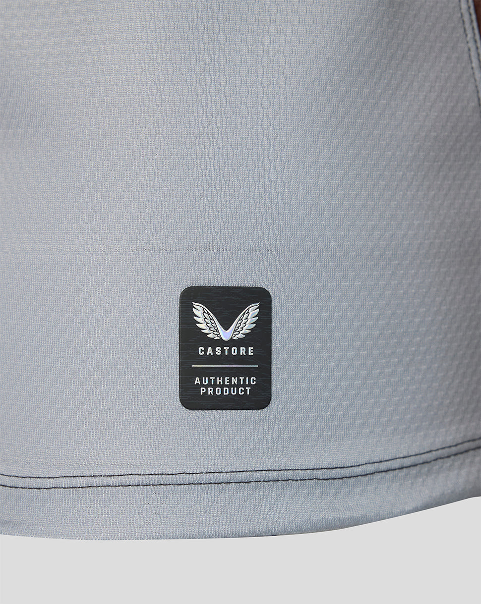 Gray fabric with a Castore logo patch on a white background