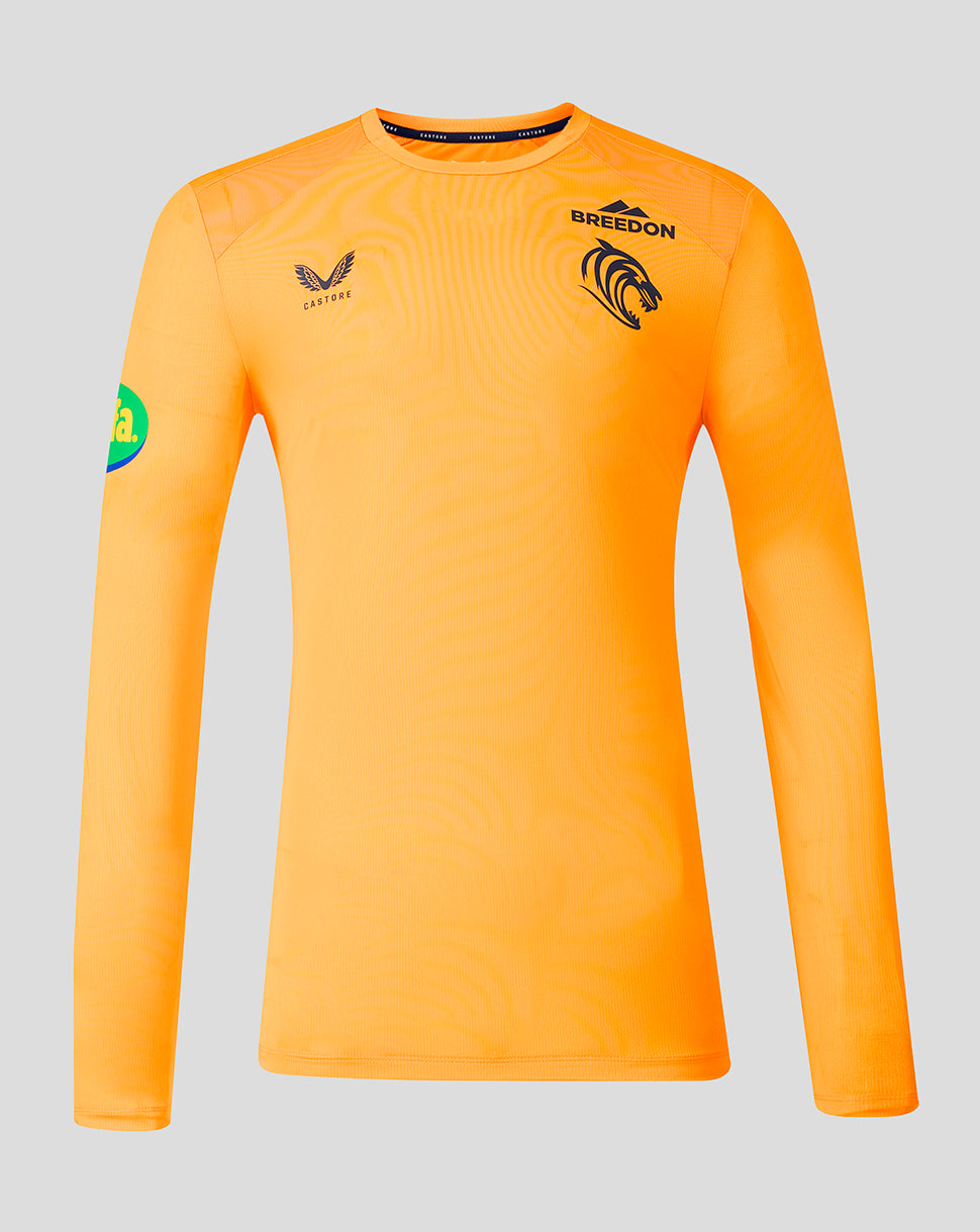 Bright orange long-sleeve athletic jersey with black printed logos, including 'BREEDON' on the chest and a winged logo on the right chest, displayed on a neutral gray background.