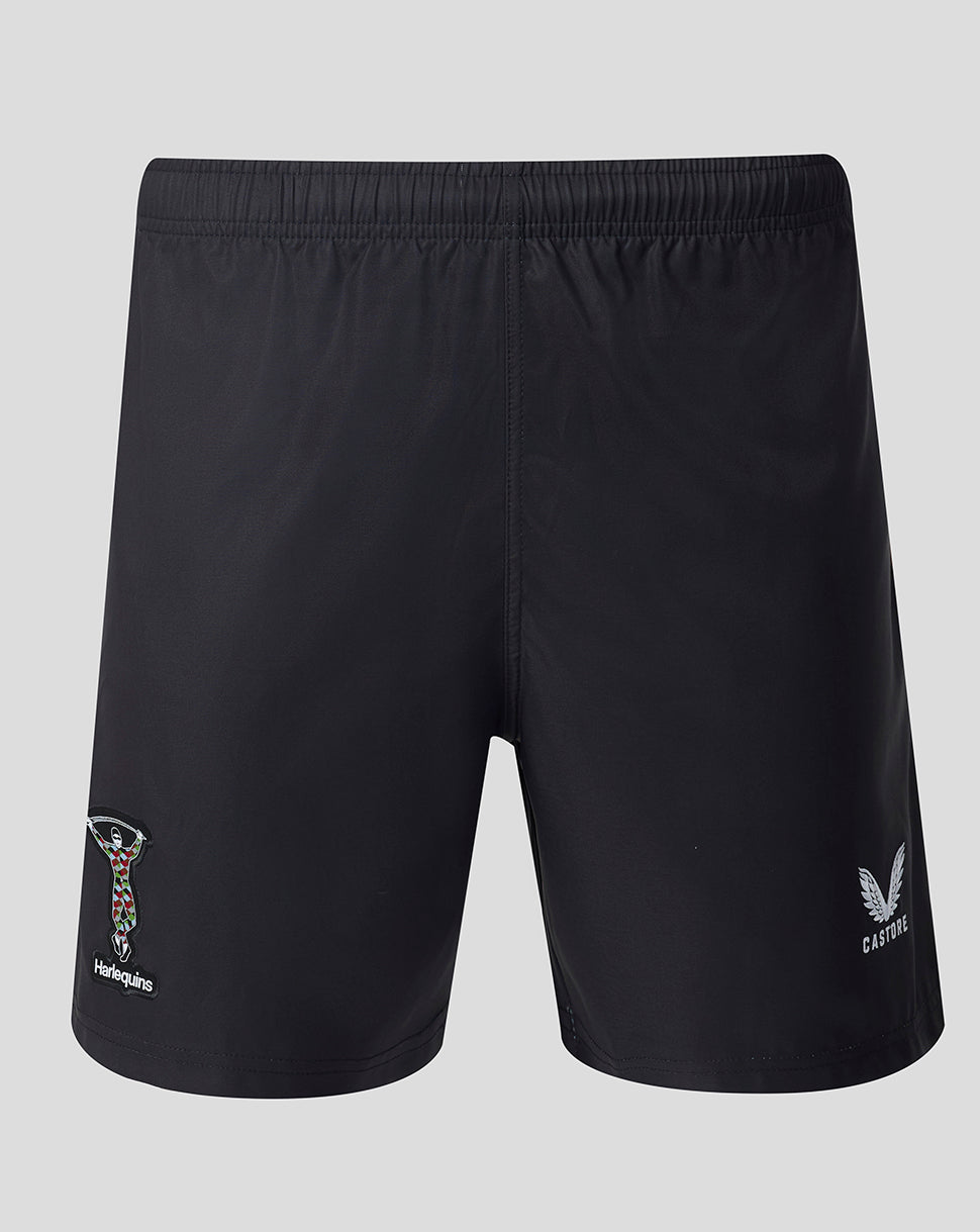 Black shorts with brand logos on a light gray background