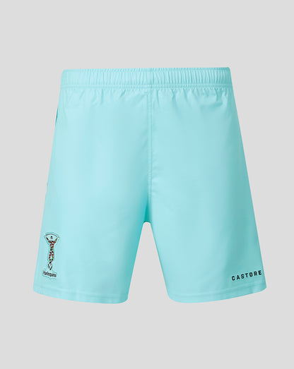 Light blue athletic shorts with an elastic waistband, featuring a small black graphic on the left leg and the word 'CASTORE' printed in black on the right leg, shown against a solid gray background.