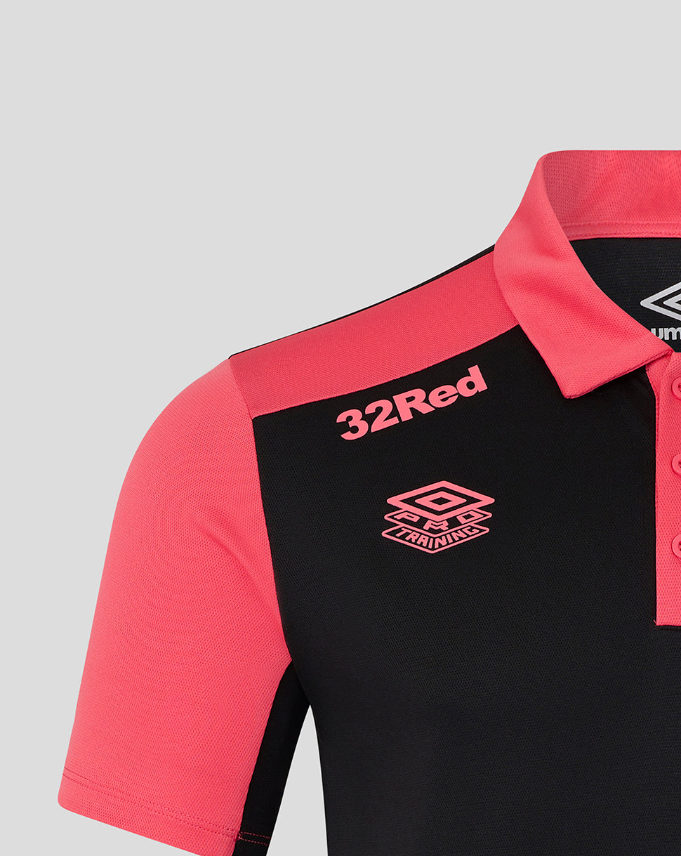 Black and pink polo shirt with '32Red' and Umbro logos on a gray background