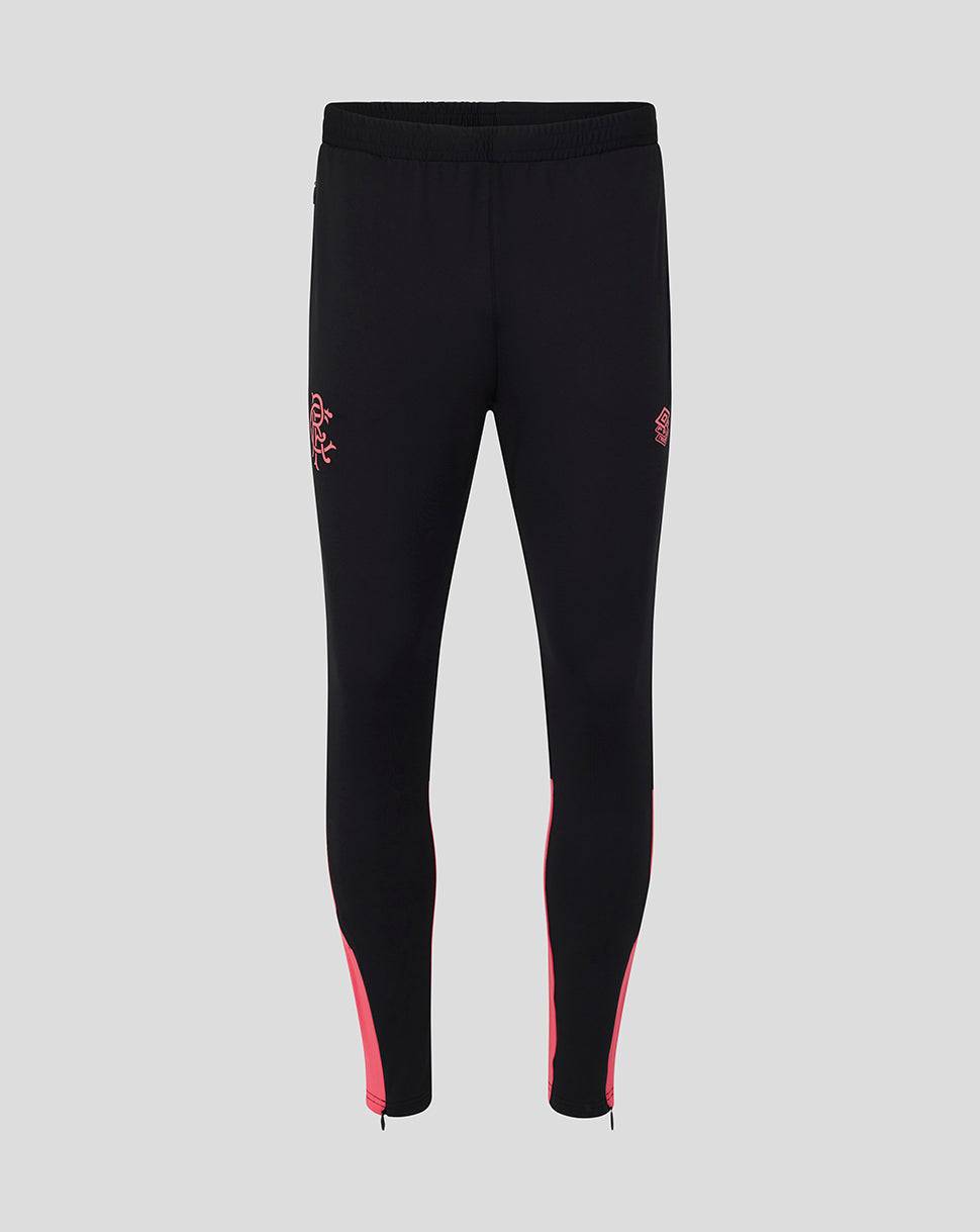 Black leggings with pink accents on a gray background