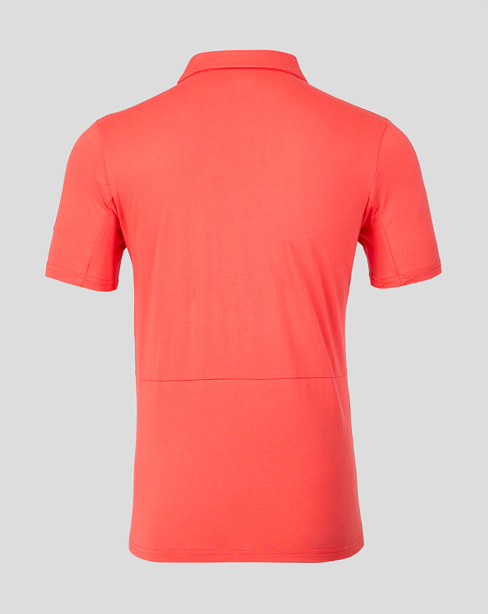 Red polo shirt on a gray background