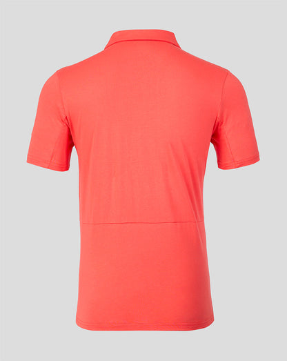 Red polo shirt on a gray background