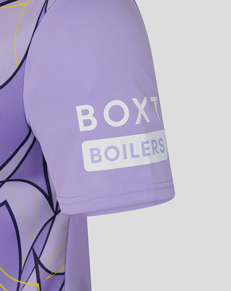 Close-up of a lavender-purple short-sleeve athletic jersey sleeve with a white BOXT BOILERS logo on the upper arm, set against a light gray background.