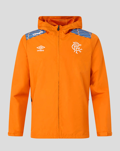 An orange hooded jacket with blue and white striped shoulder details, featuring the white Umbro logo on the right chest and the Rangers FC crest on the left chest, shown against a solid gray background.