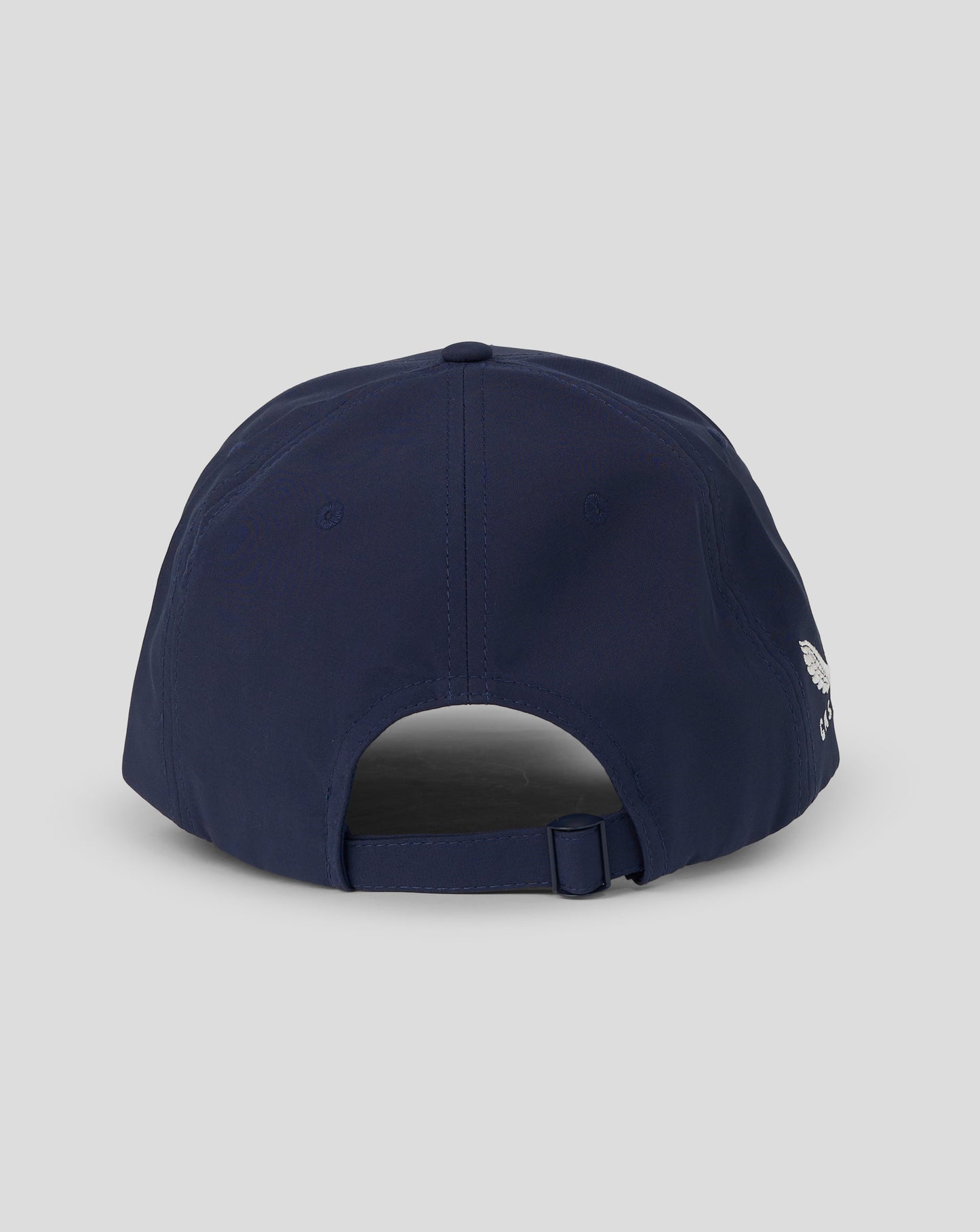 Navy blue cap with a brand logo on the back against a light gray background