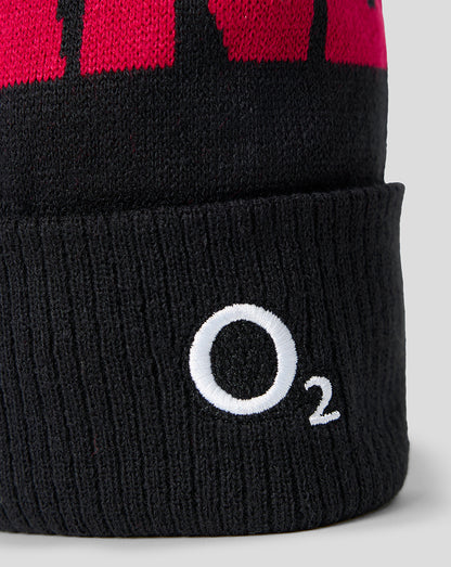 Black knit beanie with a white 'O2' logo on a gray background