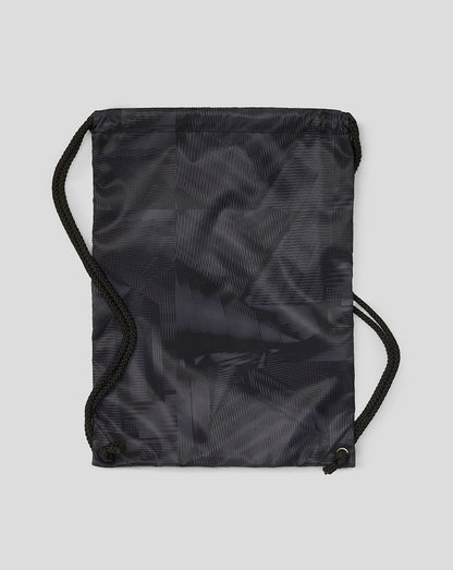 Black drawstring bag on a light gray background