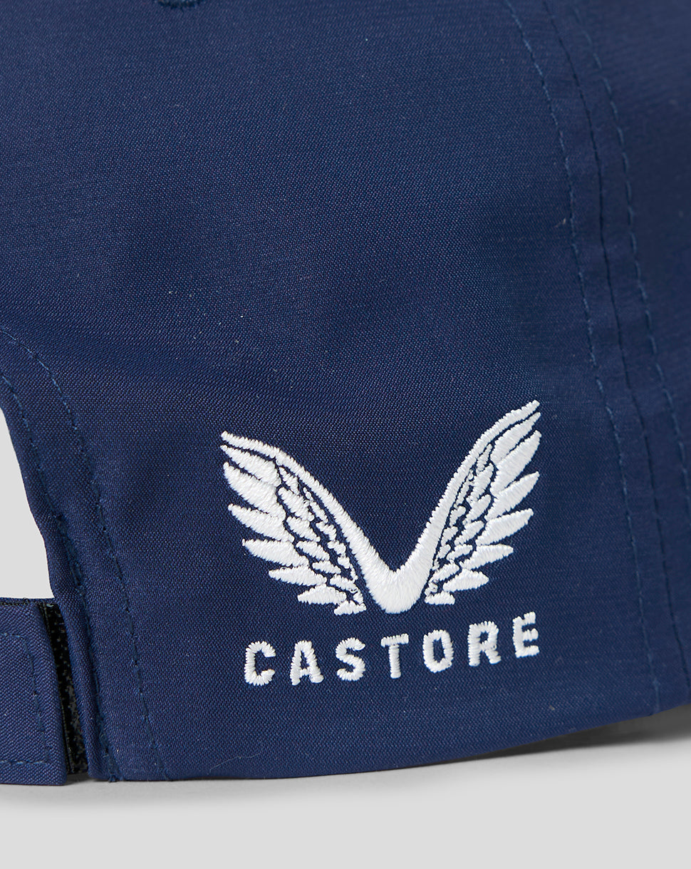 Navy blue jacket with white embroidered wings and 'CASTORE' text on a light gray background