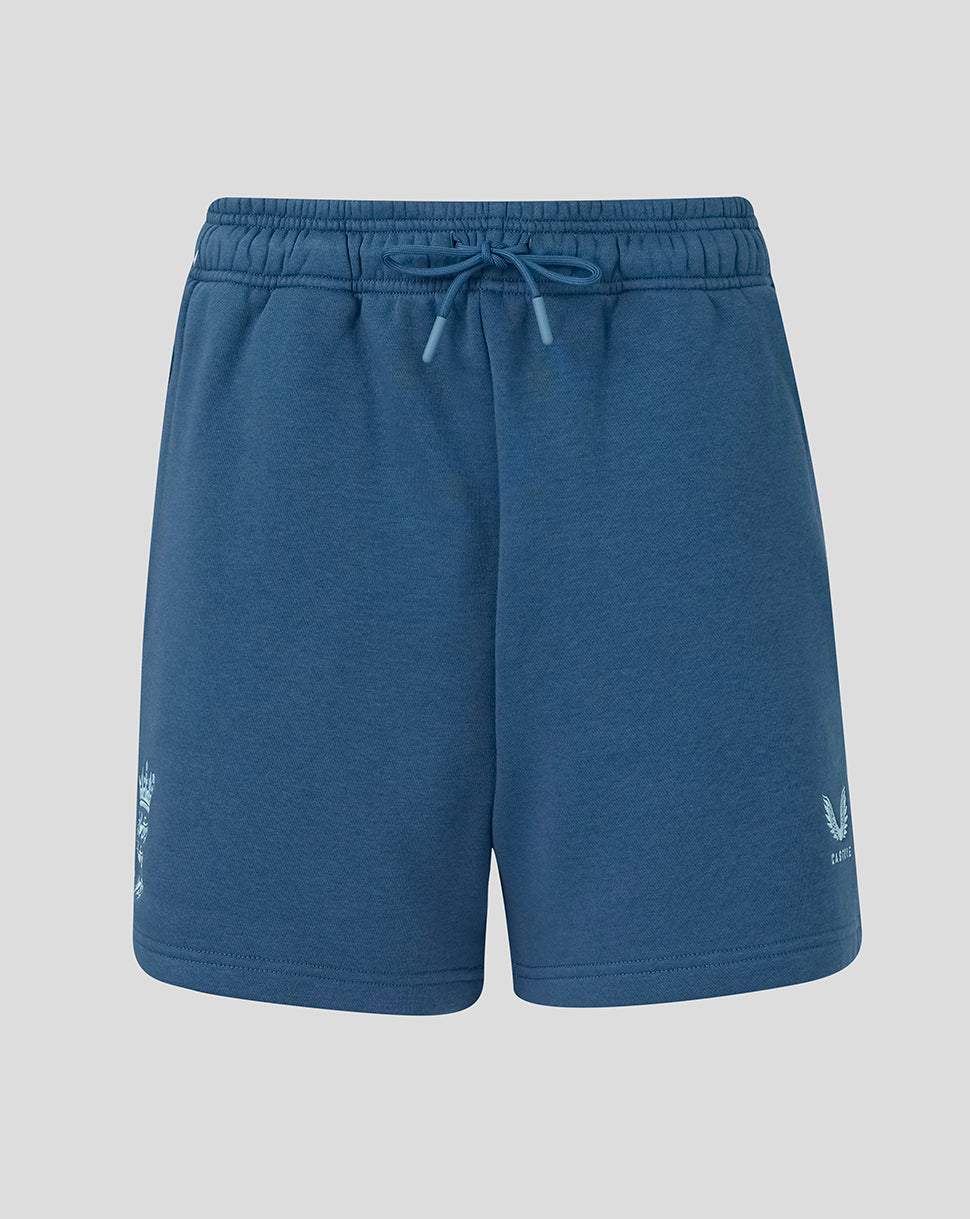Blue shorts with a brand logo on a light gray background
