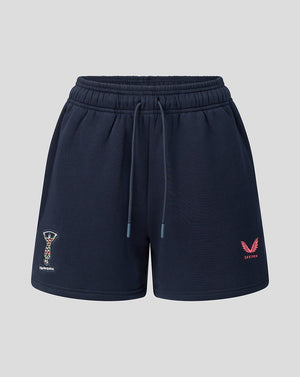 Navy blue shorts with brand logos on a light gray background