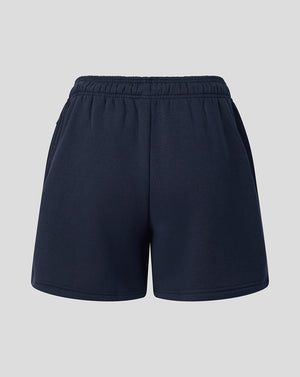 Navy blue shorts on a light gray background