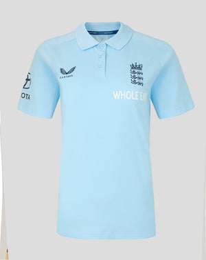 Light blue polo shirt with branding on a light gray background
