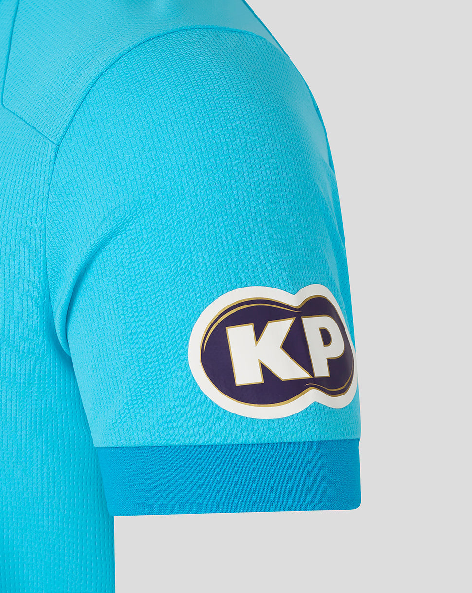 Close-up of a turquoise sports jersey with a KP logo on a white background