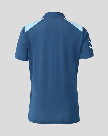 Blue polo shirt with white accents on a gray background
