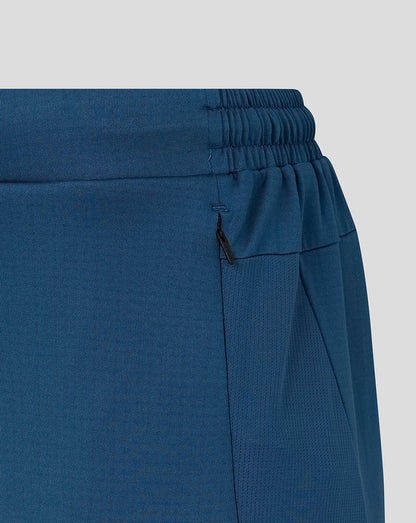 Blue pants with a drawstring waist on a light gray background