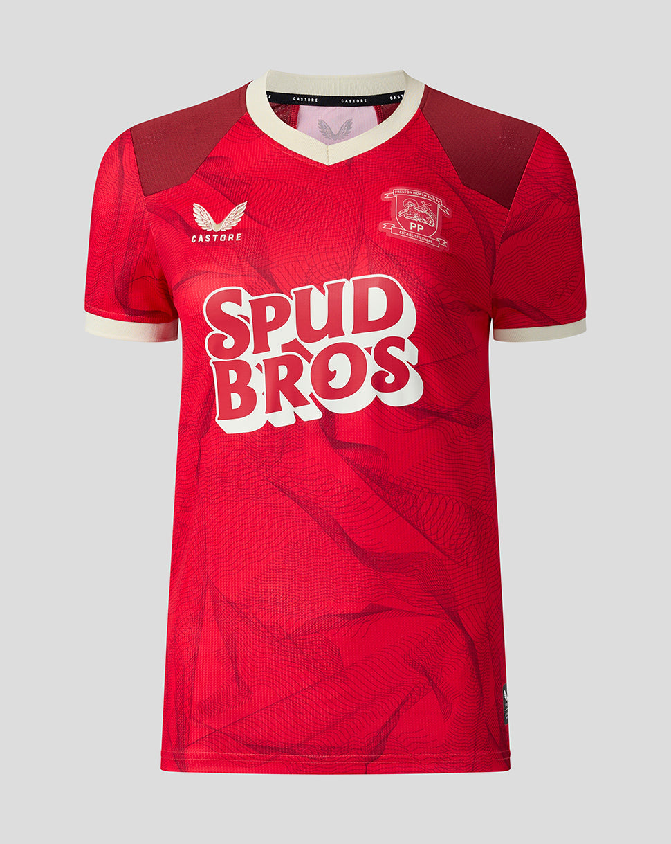A red short-sleeve soccer jersey with a textured pattern, featuring a white and red 'Spud Bros' sponsor logo on the chest, a white and red Castore logo, and a club crest on the left chest. The jersey is displayed on a neutral light gray background.