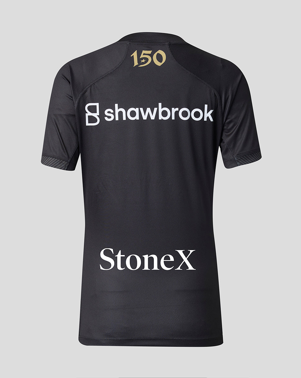 Back view of Saracens 2026/27 shirt in dark fabric with gold 150 emblem at the neck and Shawbrook and StoneX branding.