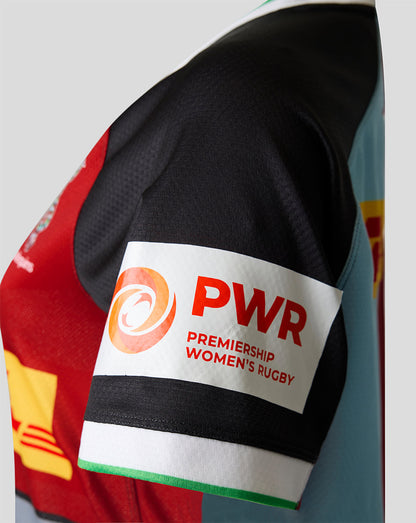 Close-up of a sports jersey with 'PWR Premiership Women's Rugby' label on a gray background