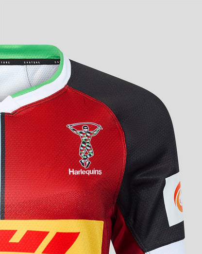 Close-up of a sports jersey with Harlequins logo on a gray background