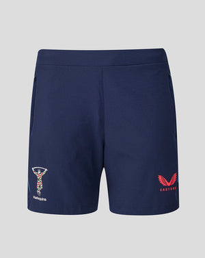 Navy blue shorts with logos on a light gray background