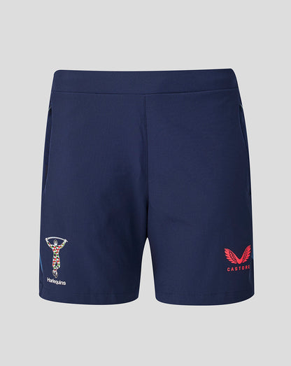 Navy blue shorts with logos on a light gray background