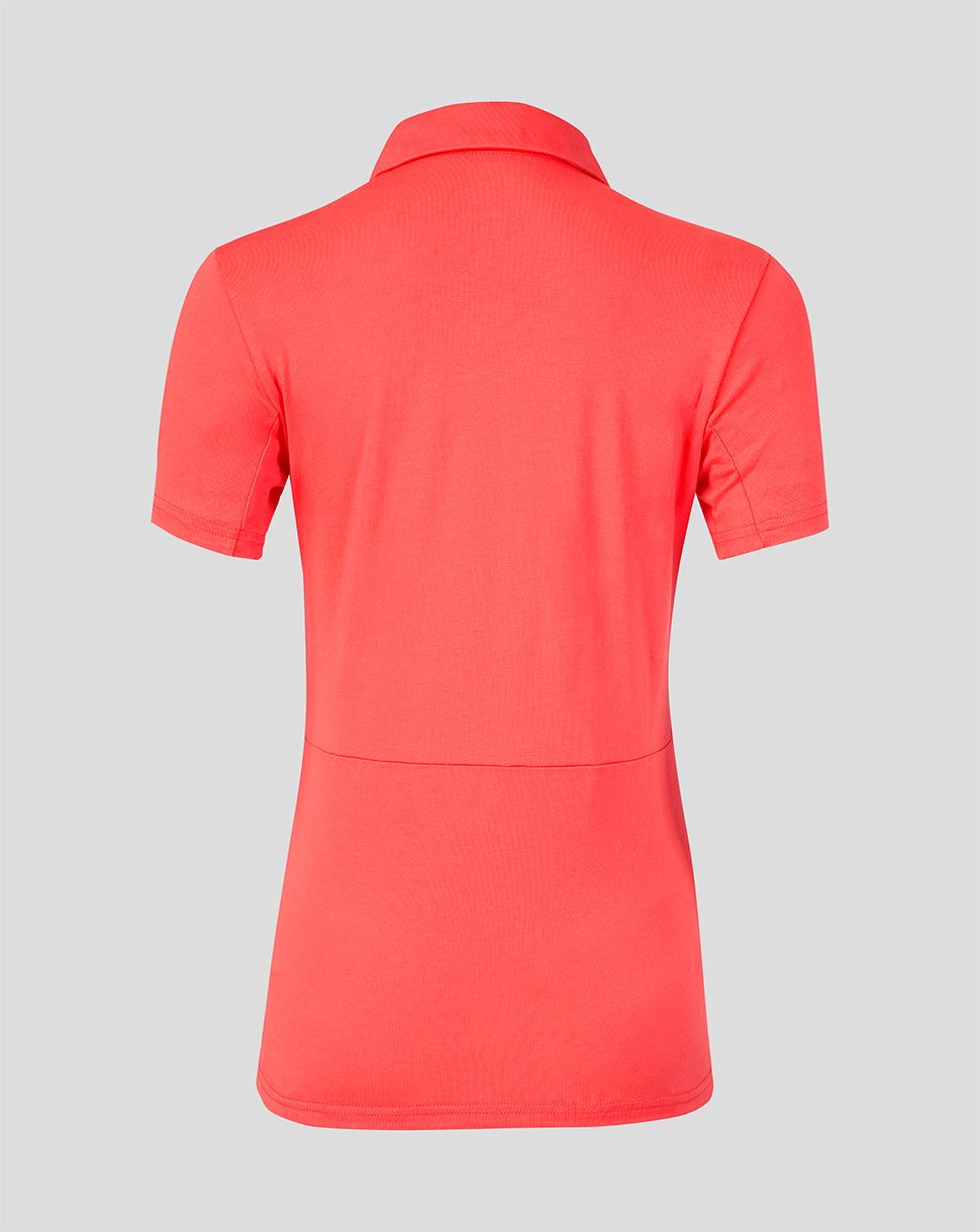 Red polo shirt on a gray background