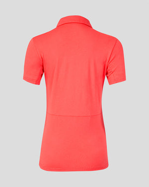 Red polo shirt on a gray background