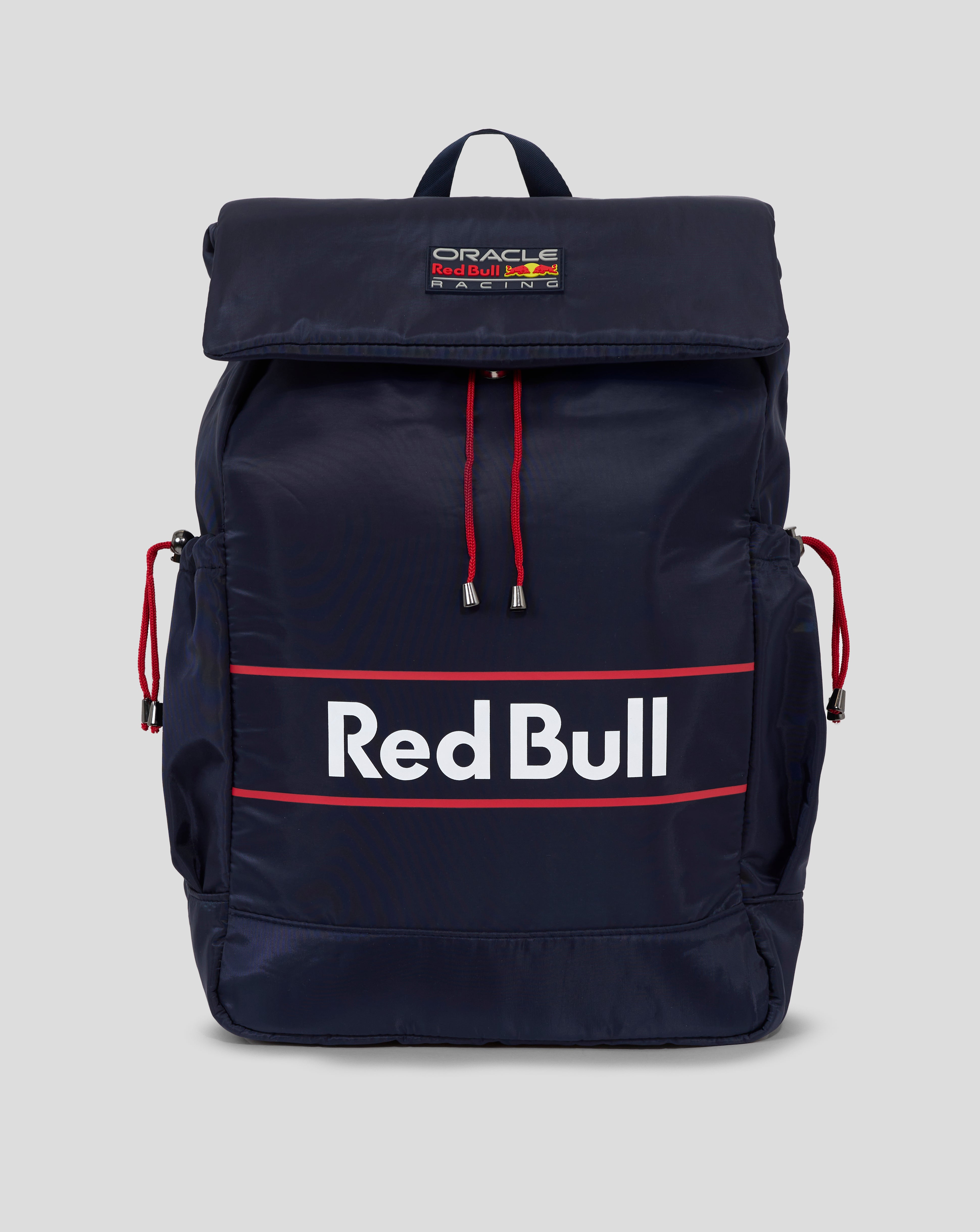Navy Red Bull Racing backpack with a folded top flap and Oracle Red Bull Racing patch on the front.