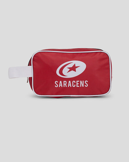 A red Saracens club washbag with a white zipper and the Saracens logo printed on the front.