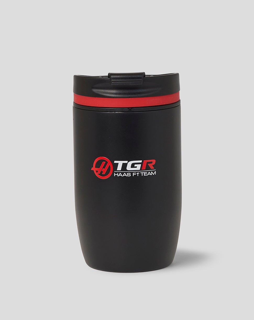 Black tumbler with red rim and TGR Haas Fit Team logo on a gray background