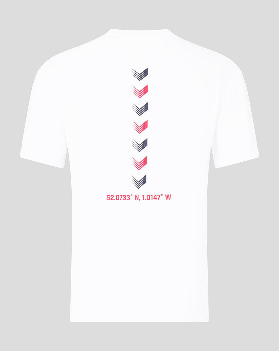 Back view of white Silverstone T shirt with a vertical row of chevrons and red coordinates printed near the lower back