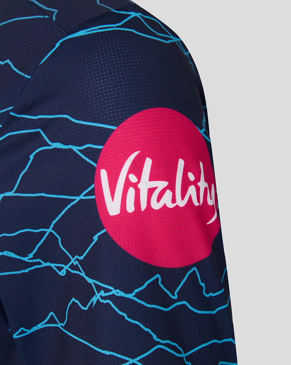 Navy blue sports jersey with a pink 'Vitality' logo on a light gray background