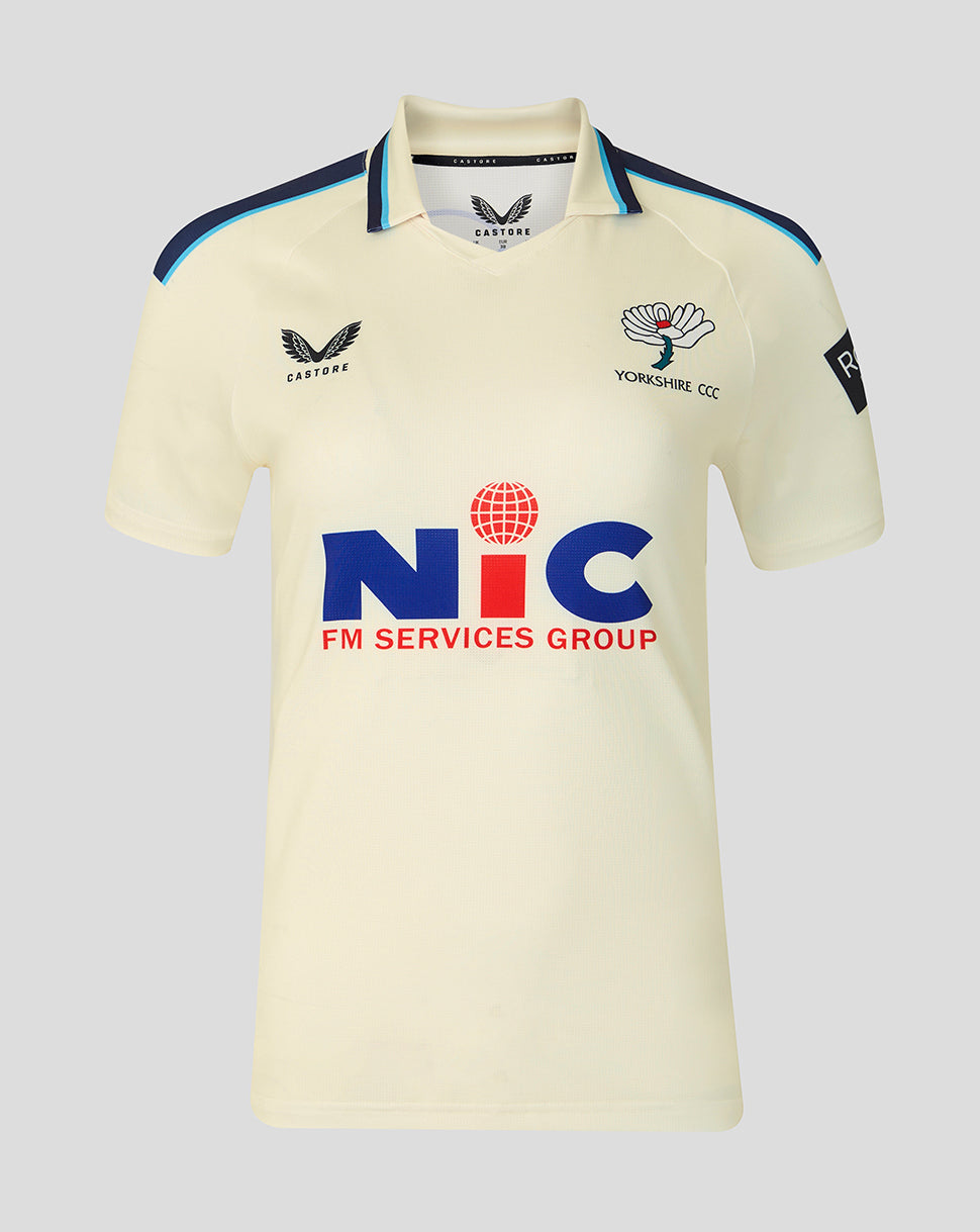 Beige sports jersey with logos on a gray background