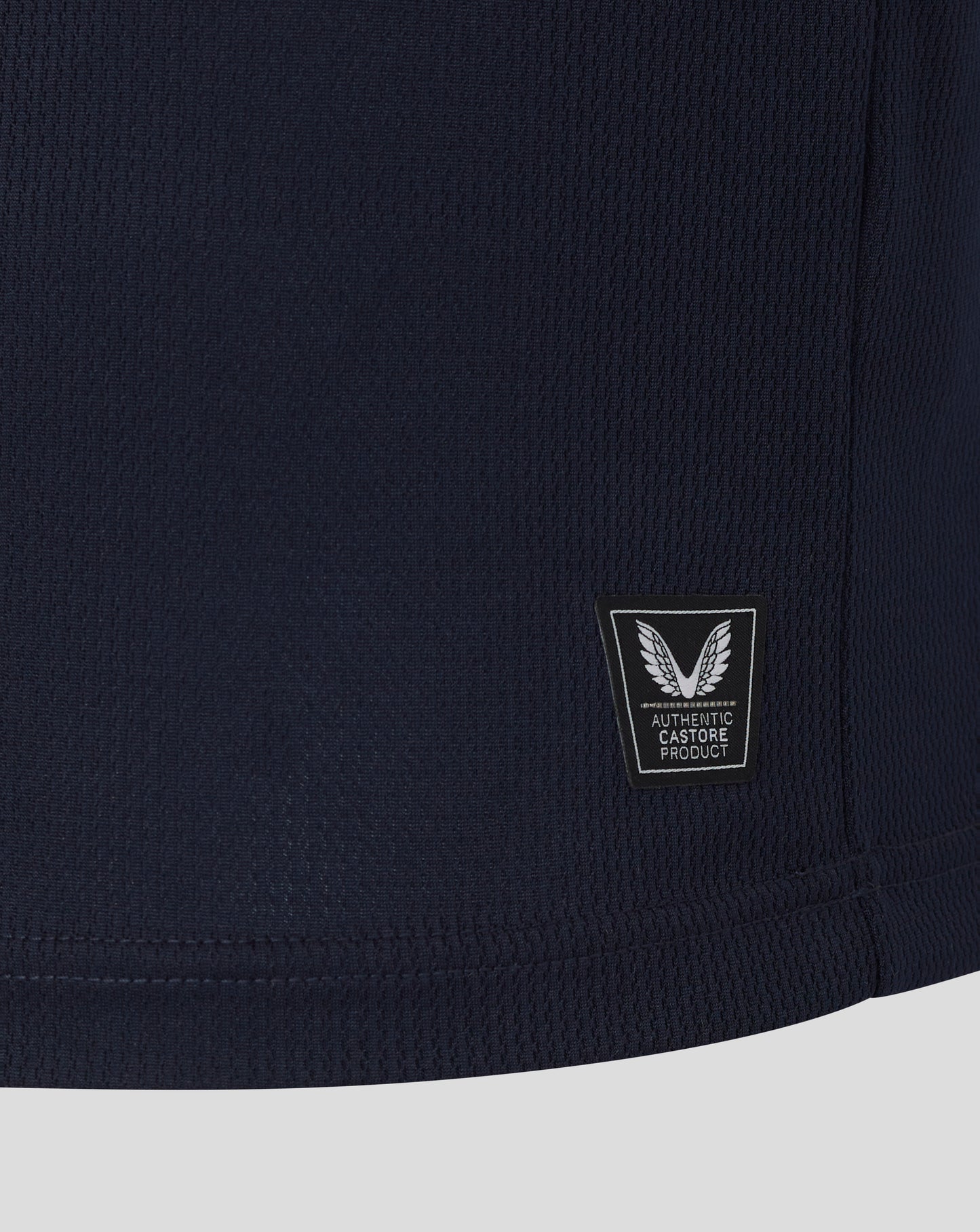 Navy blue fabric with a small logo on a white background