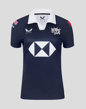 Navy blue sports jersey with white logo and branding on a gray background
