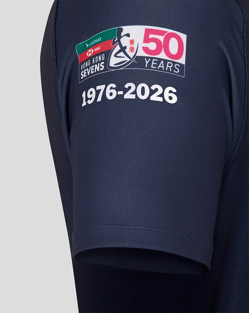 Navy blue shorts with a 50th anniversary logo on a light gray background