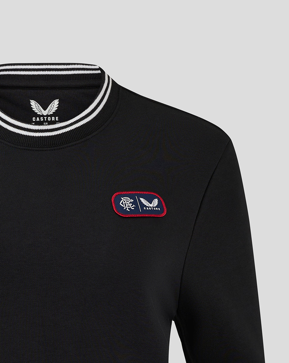 Close up of black Rangers cropped fleece crewneck showing striped rib neckline and left chest badge detail