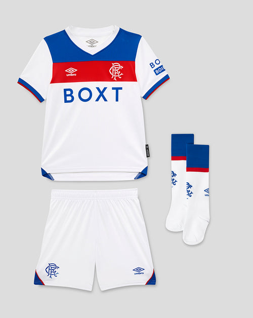 Rangers Infant 25/26 Away Kit laid out with white shirt featuring blue chest panel red stripe and BOXT sponsor, matching white shorts and socks.