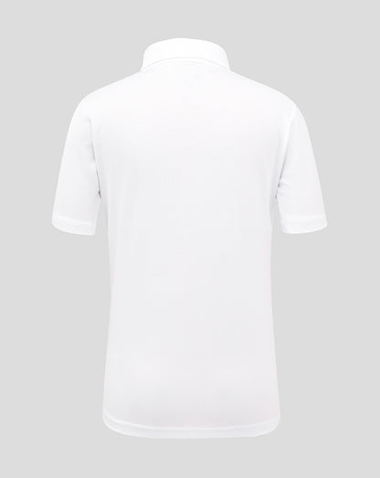 White polo shirt on a light gray background