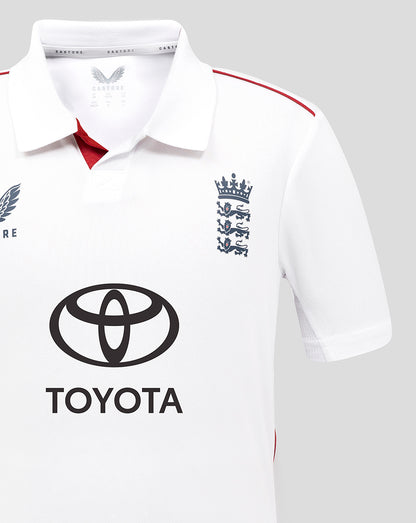 White sports jersey with Toyota logo and England cricket team emblem on a light gray background