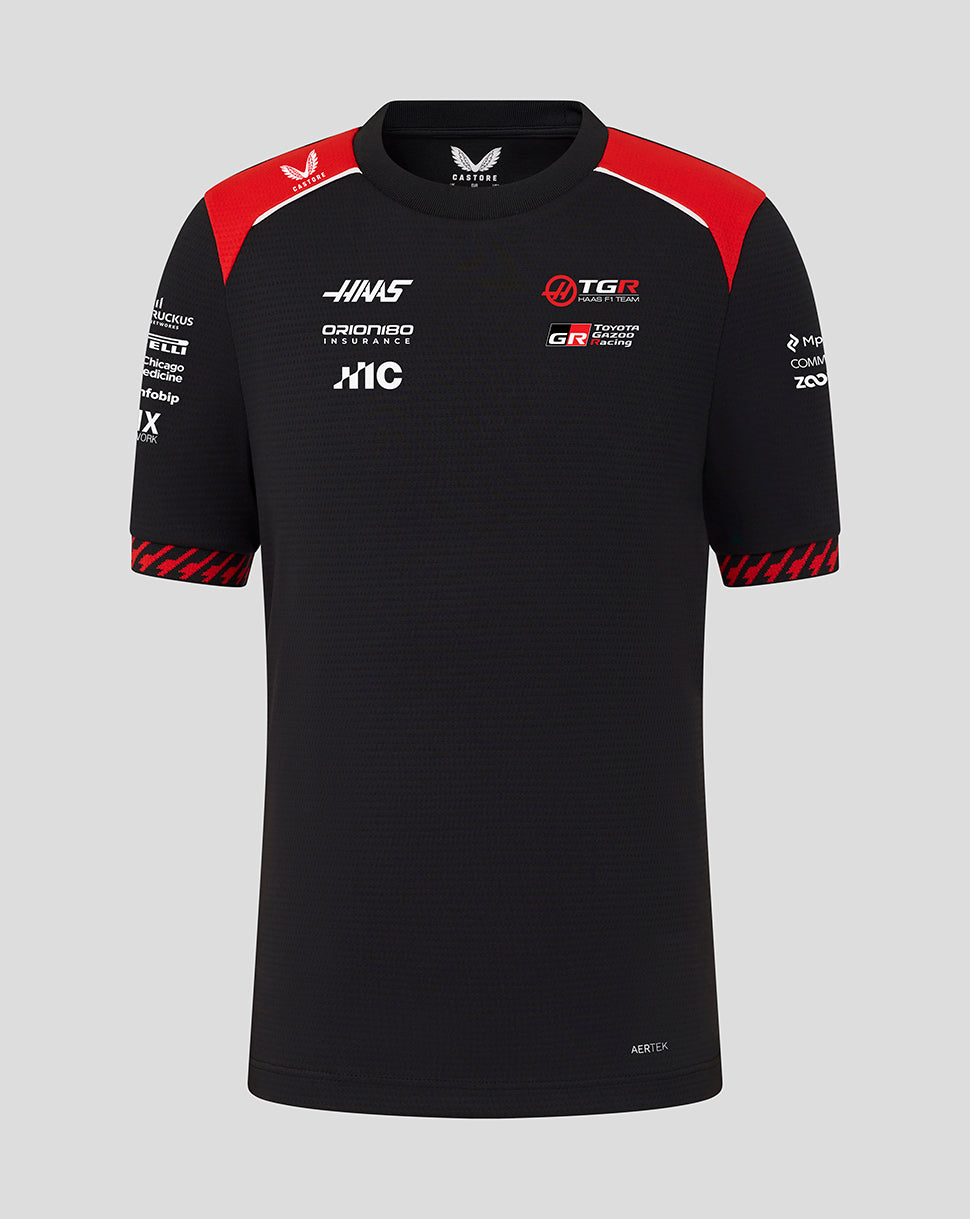 Black sports jersey with red accents and multiple brand logos on a gray background
