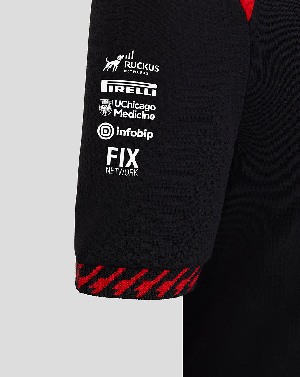 Black sleeve with brand logos on a gray background