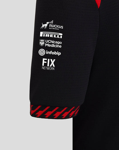 Black sleeve with brand logos on a gray background