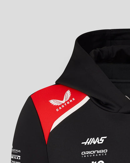 Black hoodie with red and white accents featuring Castore and Haas logos on a gray background