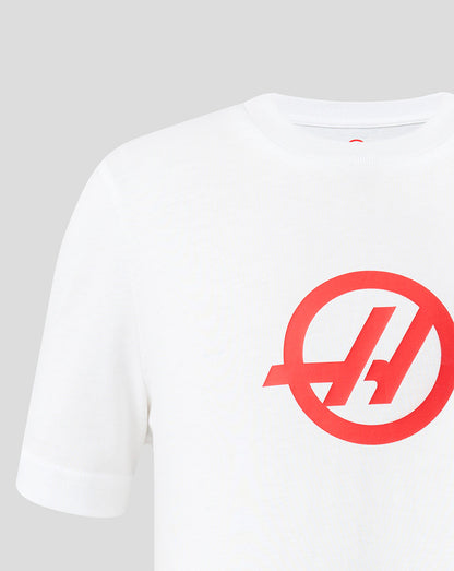 White t-shirt with a red logo on a light gray background