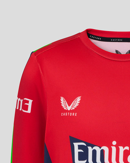 Red sports jersey with Castore and Emirates logos on a gray background
