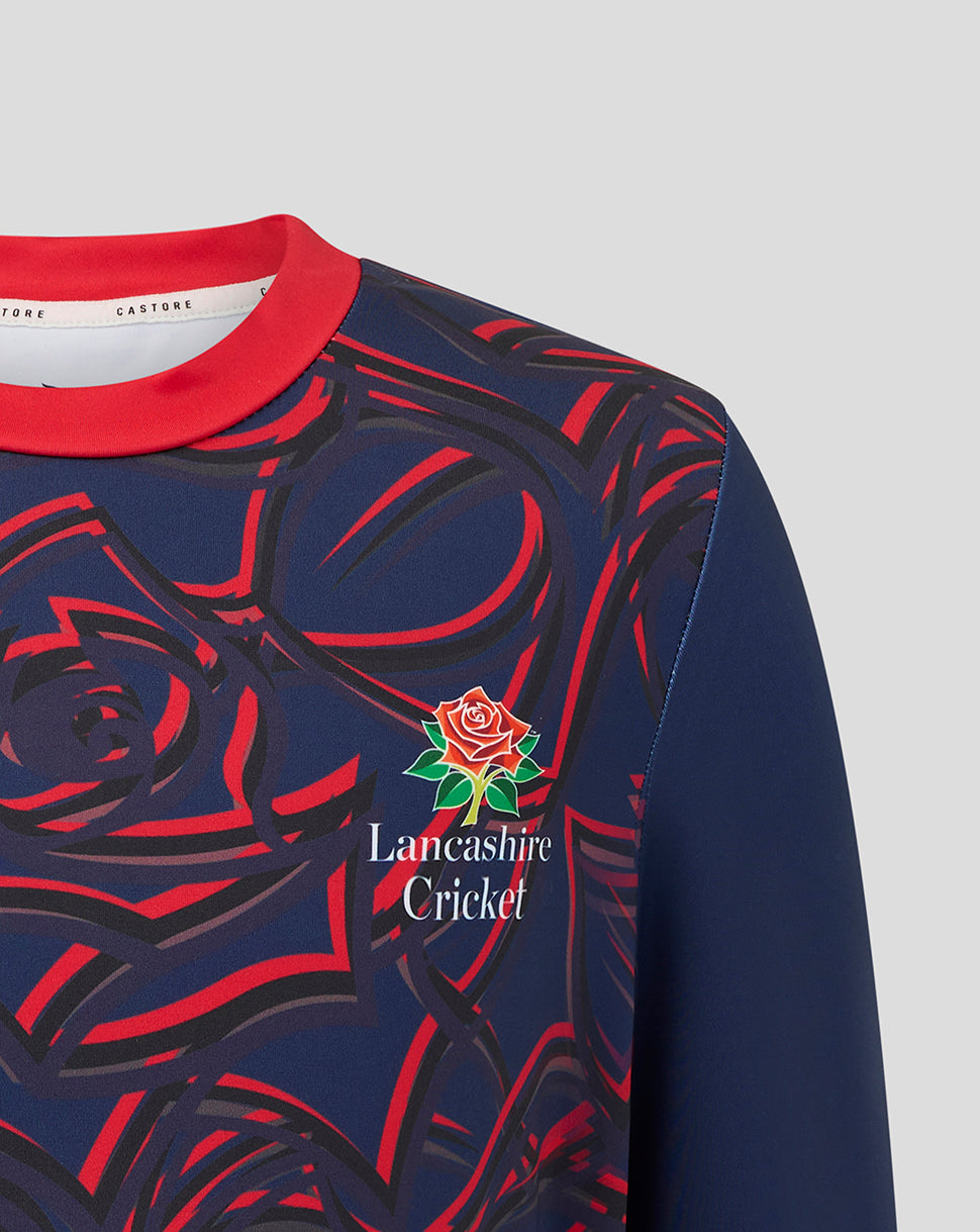 Navy and red sports jersey with Lancashire Cricket Club logo on a gray background